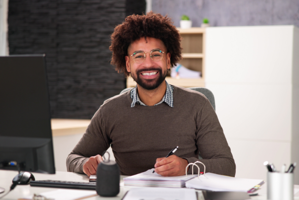 Male accountant working at his desk